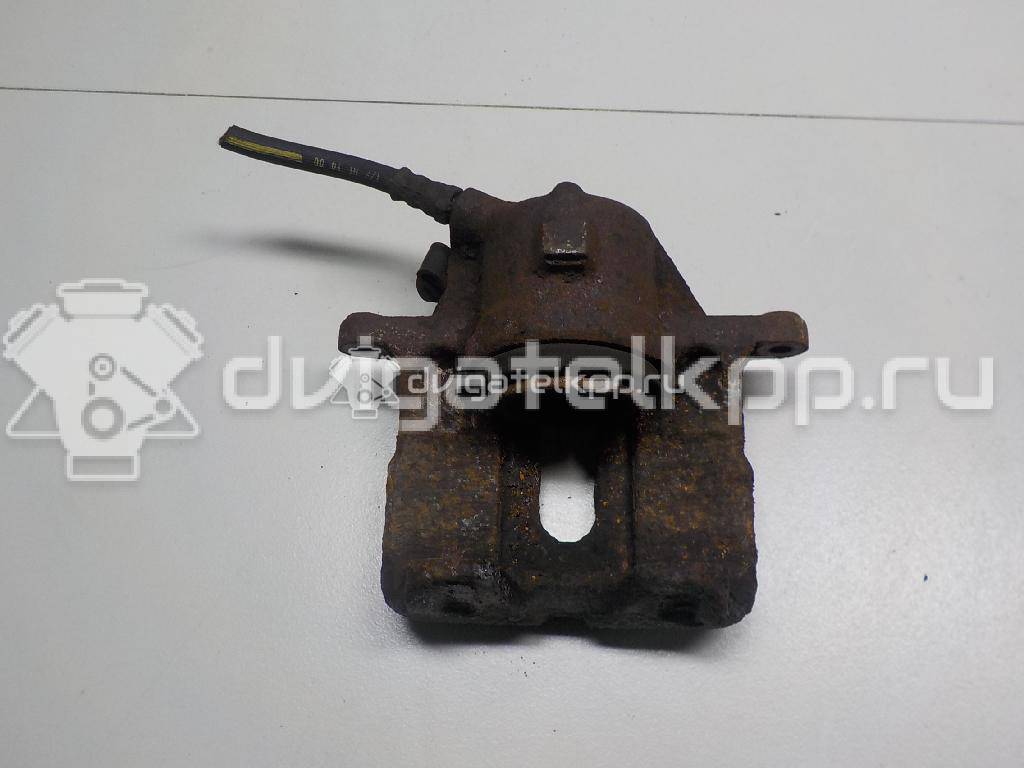 Фото Суппорт тормозной передний левый  7701207958 для Renault Sandero Stepway / Thalia 2 / 18 / 11 / Rapid F40 , G40 {forloop.counter}}