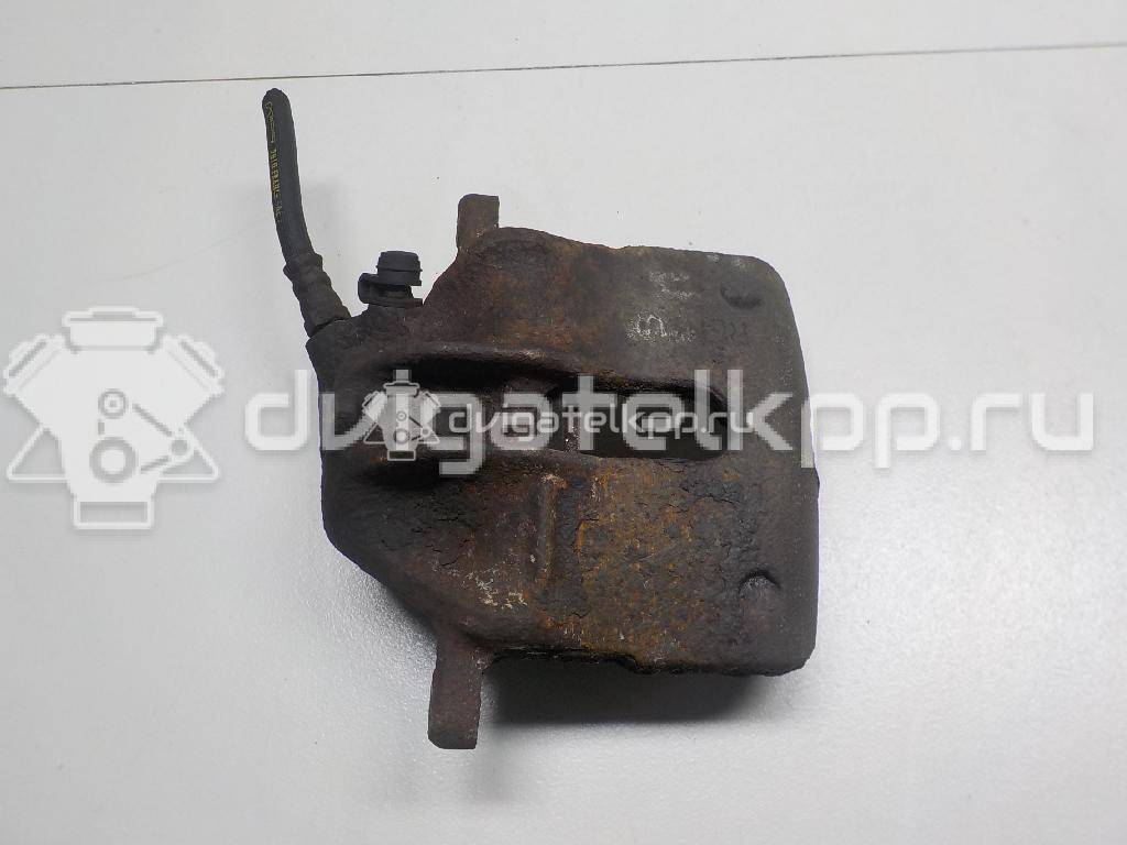 Фото Суппорт тормозной передний левый  7701207958 для Renault Sandero Stepway / Thalia 2 / 18 / 11 / Rapid F40 , G40 {forloop.counter}}