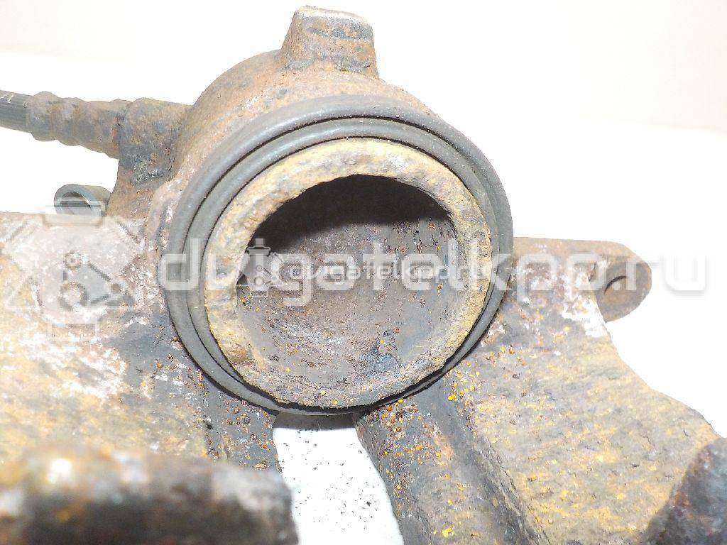 Фото Суппорт тормозной передний левый  7701207958 для Renault Sandero Stepway / Thalia 2 / 18 / 11 / Rapid F40 , G40 {forloop.counter}}