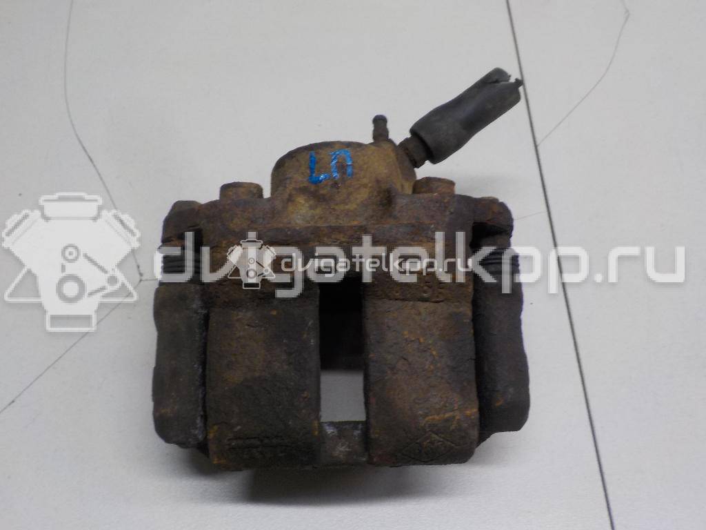 Фото Суппорт тормозной передний левый  7701207958 для Renault Sandero Stepway / Thalia 2 / 18 / 11 / Rapid F40 , G40 {forloop.counter}}