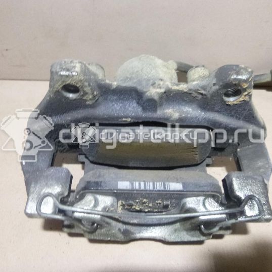 Фото Суппорт тормозной передний правый  410016069R для Renault Clio / Logan / Twingo