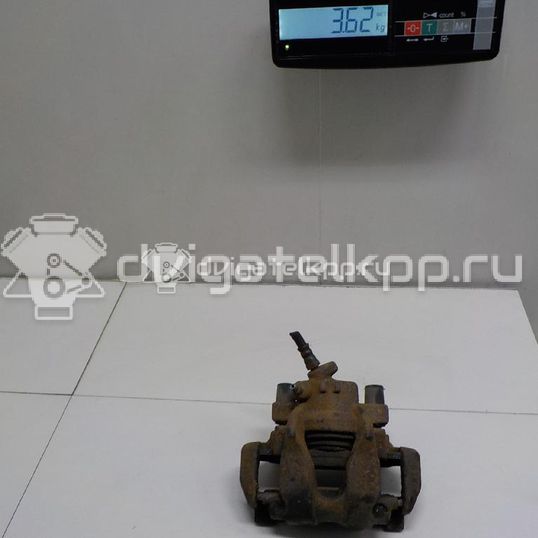 Фото Суппорт тормозной передний правый  410016069R для Renault Clio / Logan / Twingo