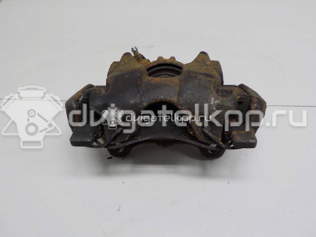 Фото Суппорт тормозной передний правый  410016069R для Renault Clio / Logan / Twingo {forloop.counter}}