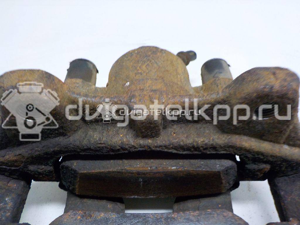 Фото Суппорт тормозной передний правый  410016069R для Renault Clio / Logan / Twingo {forloop.counter}}