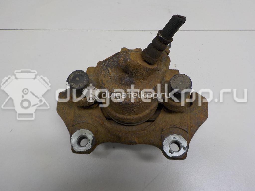 Фото Суппорт тормозной передний правый  410016069R для Renault Clio / Logan / Twingo {forloop.counter}}