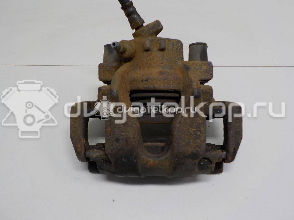 Фото Суппорт тормозной передний правый  410016069R для Renault Clio / Logan / Twingo {forloop.counter}}