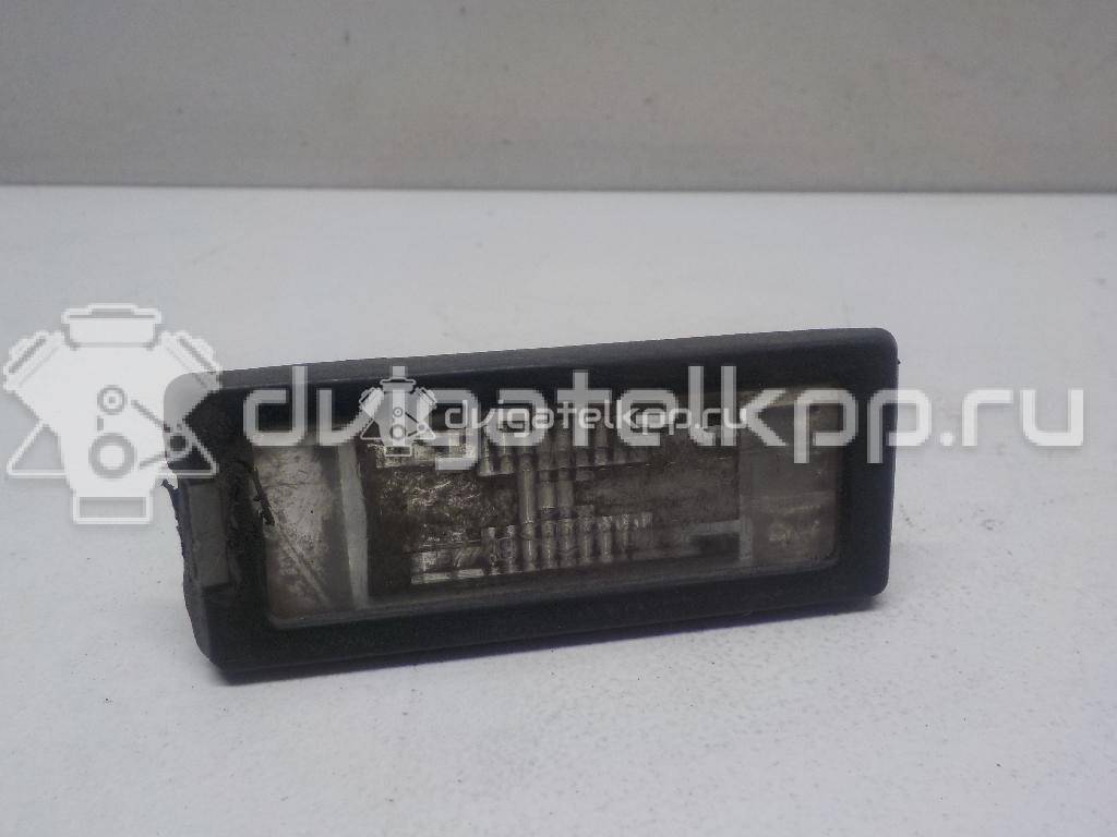 Фото Фонарь подсветки номера  8200013577 для Renault Modus Grand F Jp0 / Megane / Clio / Laguna / Scénic {forloop.counter}}