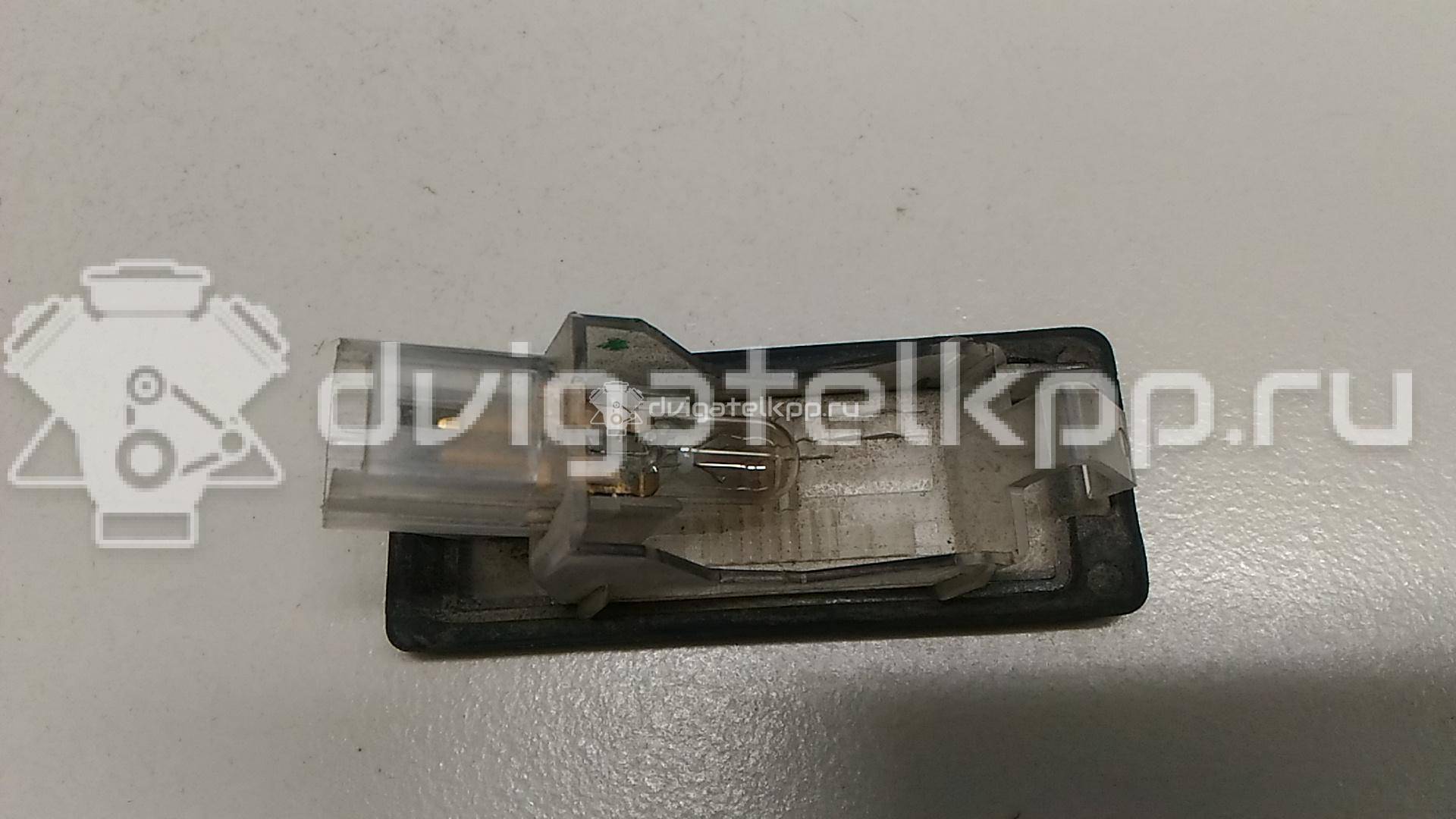 Фото Фонарь подсветки номера  8200013577 для Renault Modus Grand F Jp0 / Megane / Clio / Laguna / Scénic {forloop.counter}}