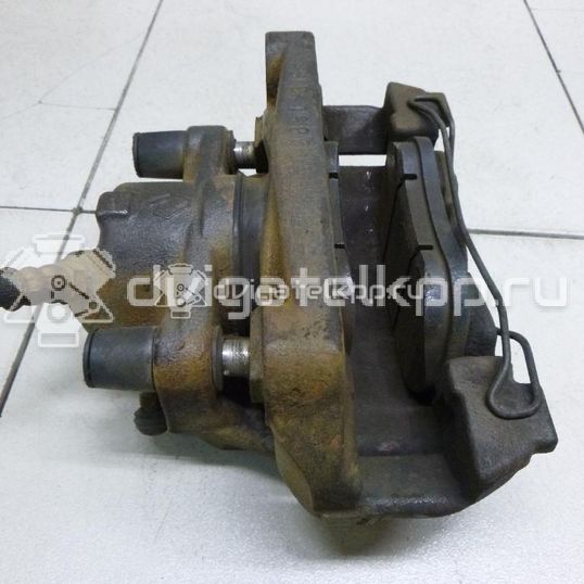 Фото Суппорт тормозной передний левый  410111495R для Renault Megane / Scénic / Grand / Captur J5 / Fluence L30