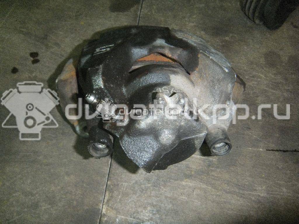 Фото Суппорт тормозной передний левый  410111495R для Renault Megane / Scénic / Grand / Captur J5 / Fluence L30 {forloop.counter}}