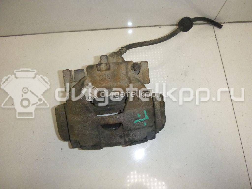 Фото Суппорт тормозной передний левый  410111495R для Renault Megane / Scénic / Grand / Captur J5 / Fluence L30 {forloop.counter}}