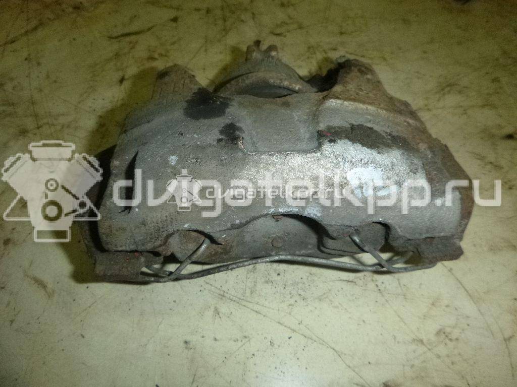 Фото Суппорт тормозной передний левый  410111495R для Renault Megane / Scénic / Grand / Captur J5 / Fluence L30 {forloop.counter}}