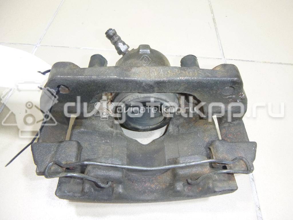 Фото Суппорт тормозной передний левый  410111495R для Renault Megane / Scénic / Grand / Captur J5 / Fluence L30 {forloop.counter}}