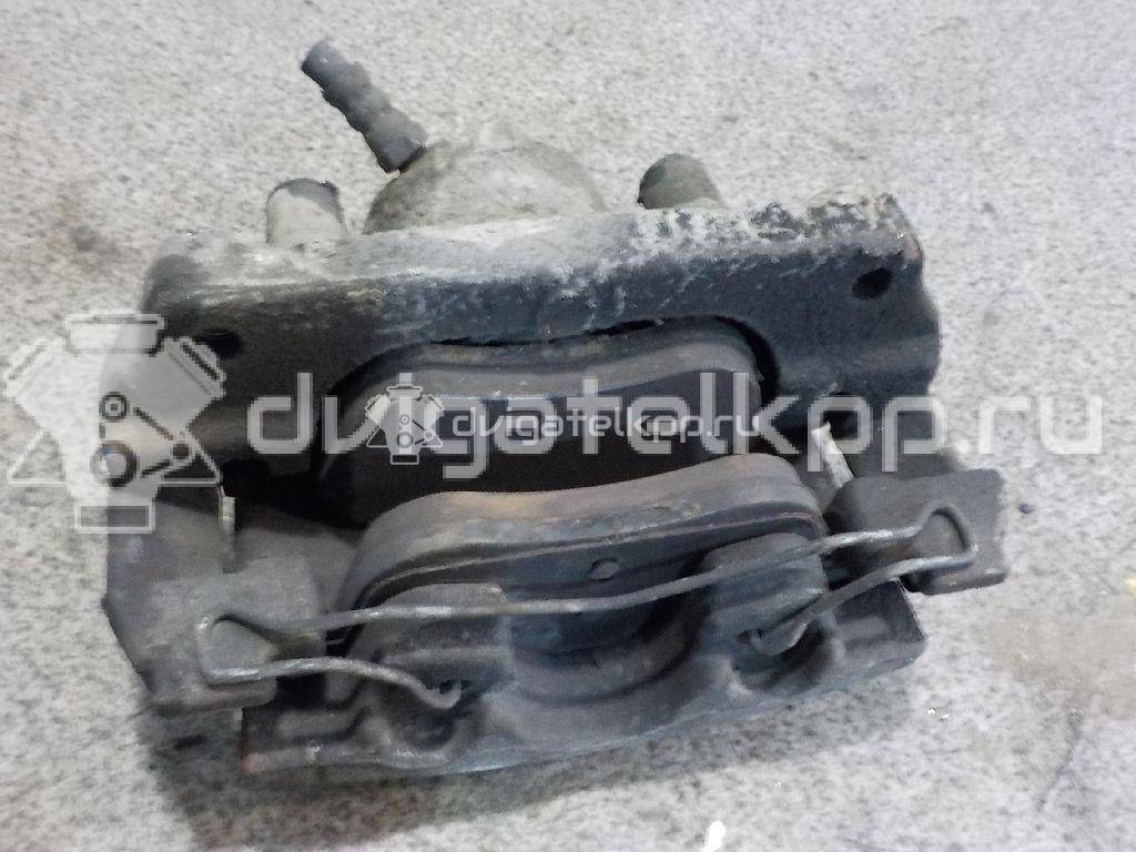 Фото Суппорт тормозной передний левый  410111495R для Renault Megane / Scénic / Grand / Captur J5 / Fluence L30 {forloop.counter}}