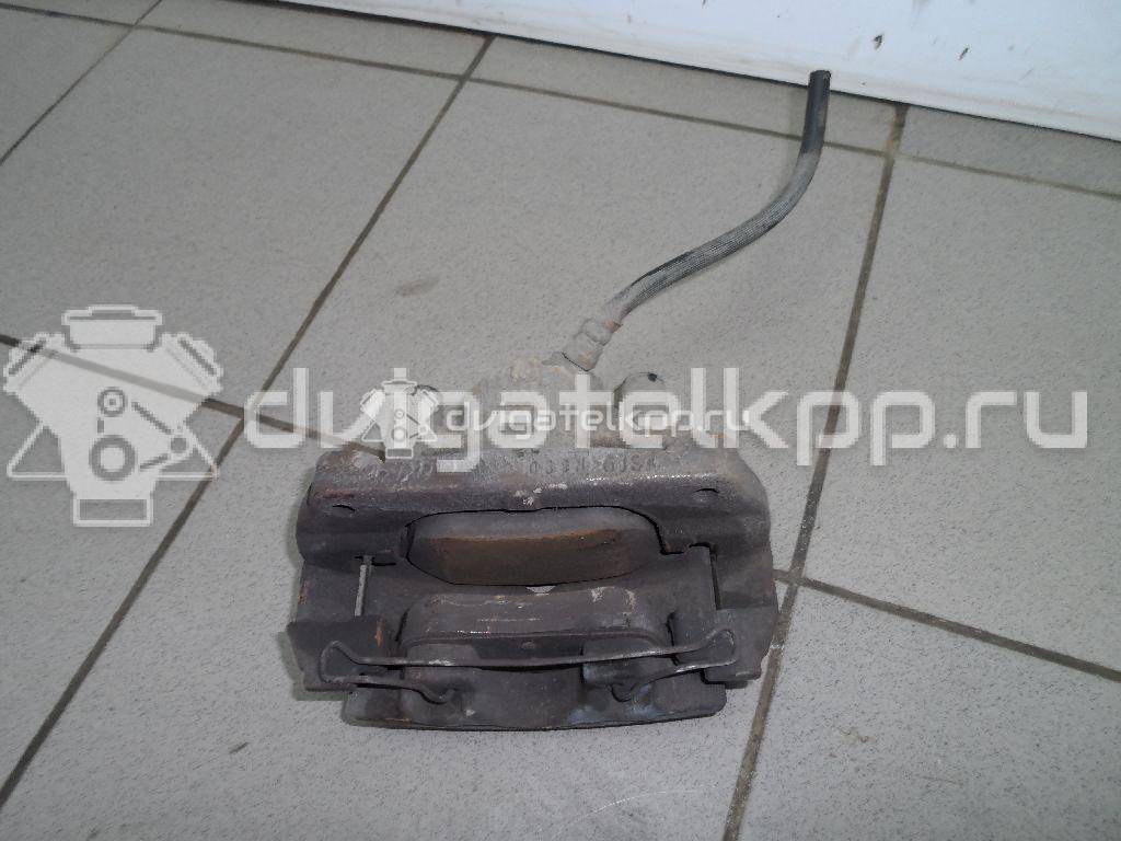 Фото Суппорт тормозной передний правый  410018218R для Renault Megane / Scénic / Grand / Captur J5 / Fluence L30 {forloop.counter}}