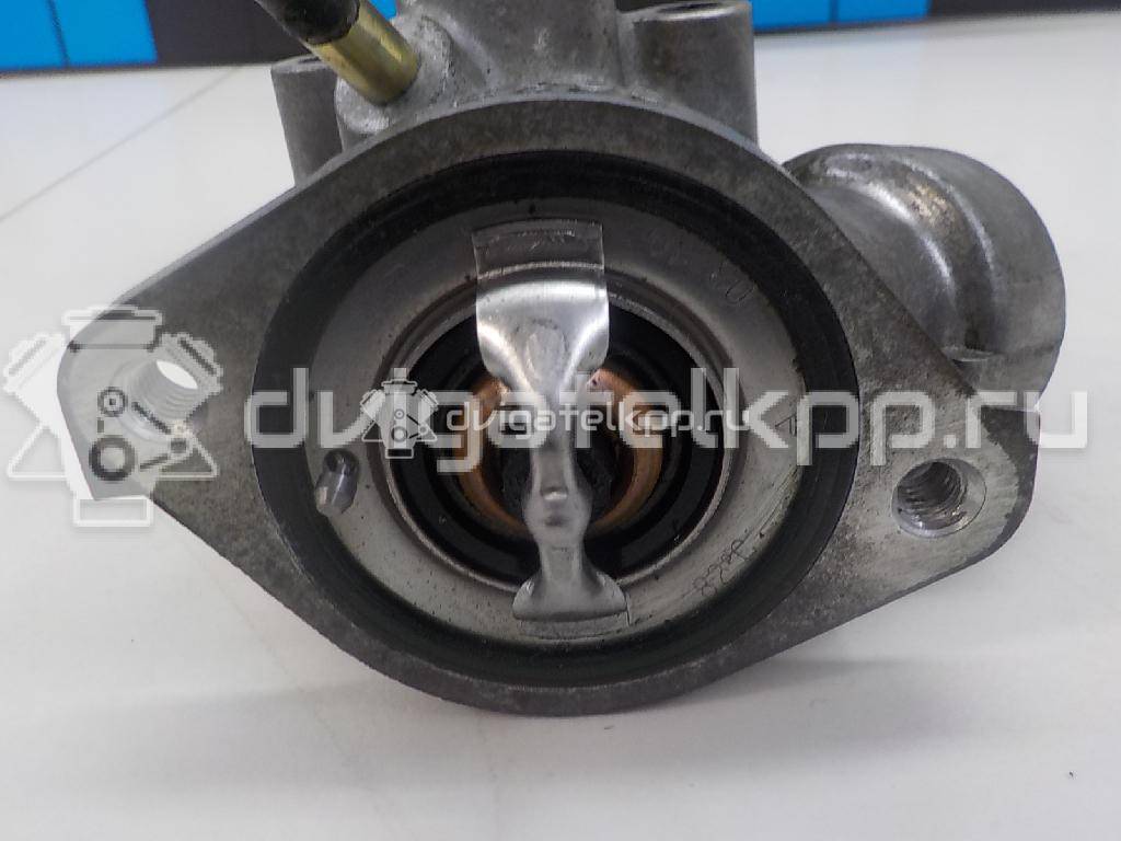 Фото Корпус термостата для двигателя 4G69 для Mitsubishi Outlander / Galant / Grandis Na W 154-177 л.с 16V 2.4 л бензин MN149477 {forloop.counter}}