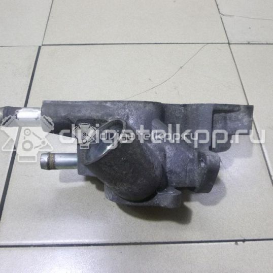 Фото Корпус термостата для двигателя 4B12 для Mitsubishi Outlander 169-171 л.с 16V 2.4 л Бензин/спирт 1305A091