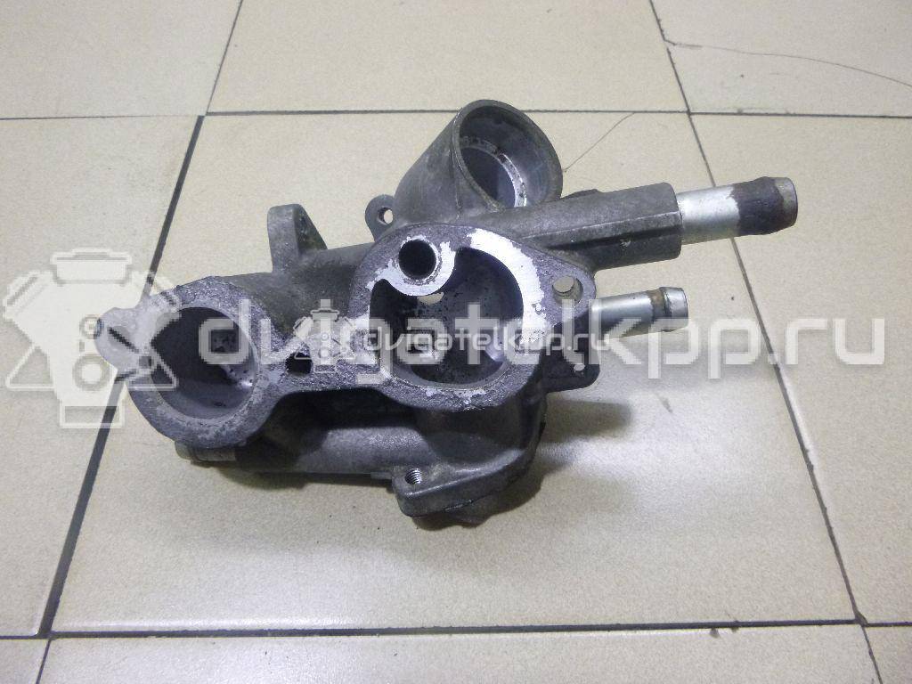 Фото Корпус термостата для двигателя 4B12 для Mitsubishi Outlander 169-171 л.с 16V 2.4 л Бензин/спирт 1305A091 {forloop.counter}}