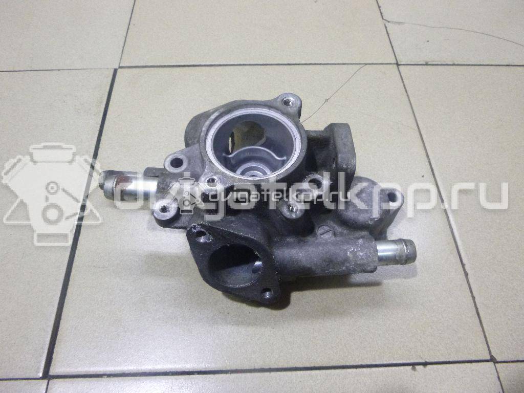 Фото Корпус термостата для двигателя 4B12 для Mitsubishi Outlander 169-171 л.с 16V 2.4 л Бензин/спирт 1305A091 {forloop.counter}}