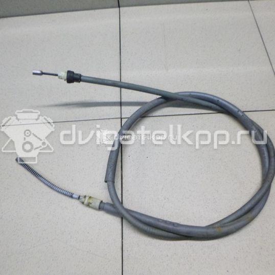 Фото Трос стояночного тормоза  6001547168 для Renault Logan