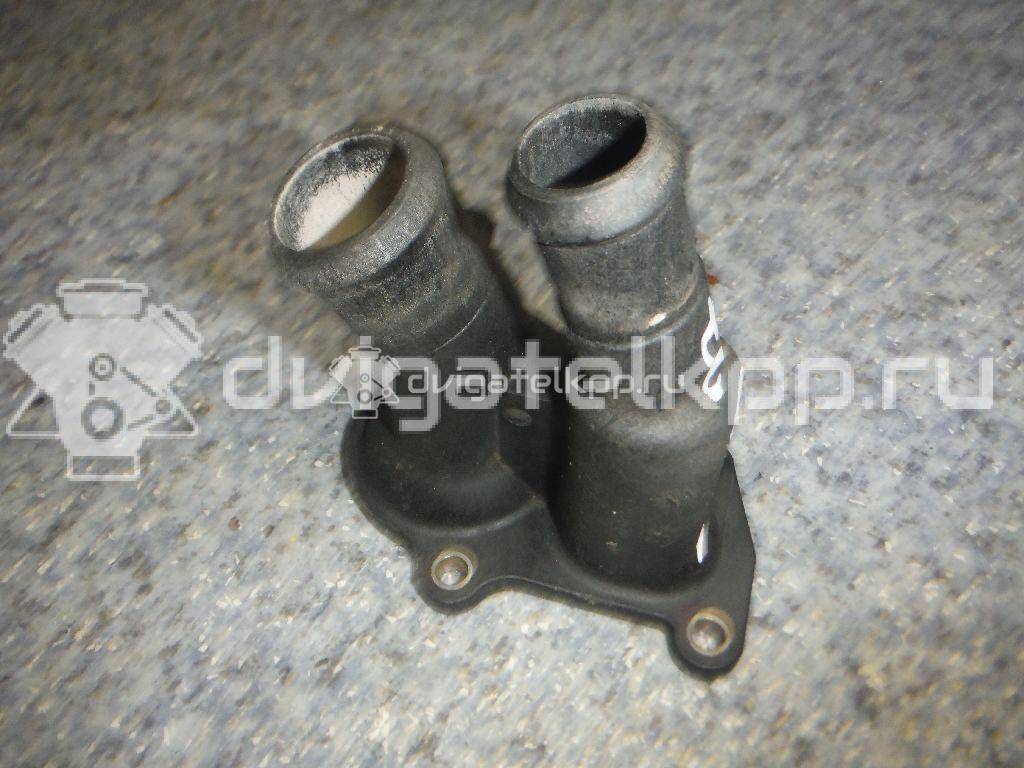 Фото Крышка термостата для двигателя IQDB для Ford Focus / C-Max / Grand 105 л.с 16V 1.6 л бензин 1707050 {forloop.counter}}