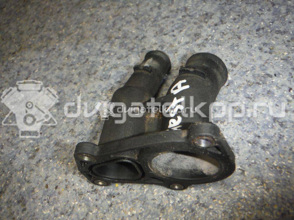 Фото Крышка термостата для двигателя IQDB для Ford Focus / C-Max / Grand 105 л.с 16V 1.6 л бензин 1707050 {forloop.counter}}