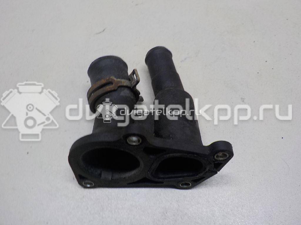 Фото Крышка термостата для двигателя IQDB для Ford Focus / C-Max / Grand 105 л.с 16V 1.6 л бензин 1707050 {forloop.counter}}