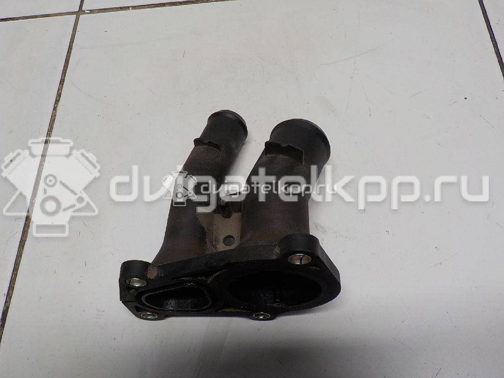 Фото Крышка термостата для двигателя IQDB для Ford Focus / C-Max / Grand 105 л.с 16V 1.6 л бензин 1707050 {forloop.counter}}