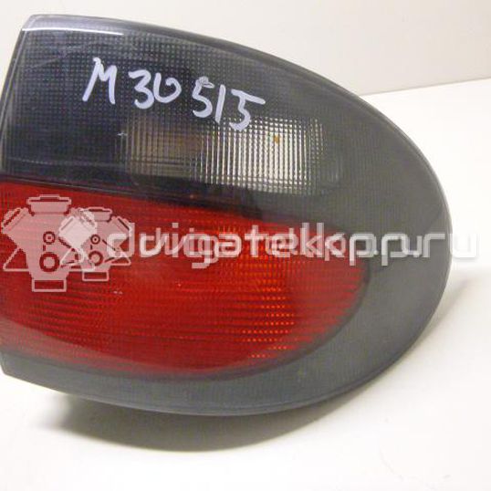 Фото Фонарь задний наружный правый  7701042629 для Renault Megane