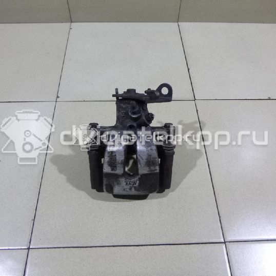 Фото Суппорт тормозной задний правый  7701208262 для Renault Grand / Megane / Clio / Scénic / Kangoo 1