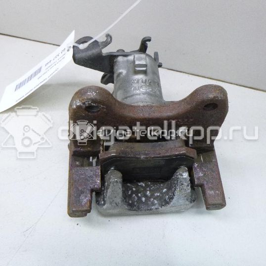 Фото Суппорт тормозной задний правый  7701208262 для Renault Grand / Megane / Clio / Scénic / Kangoo 1