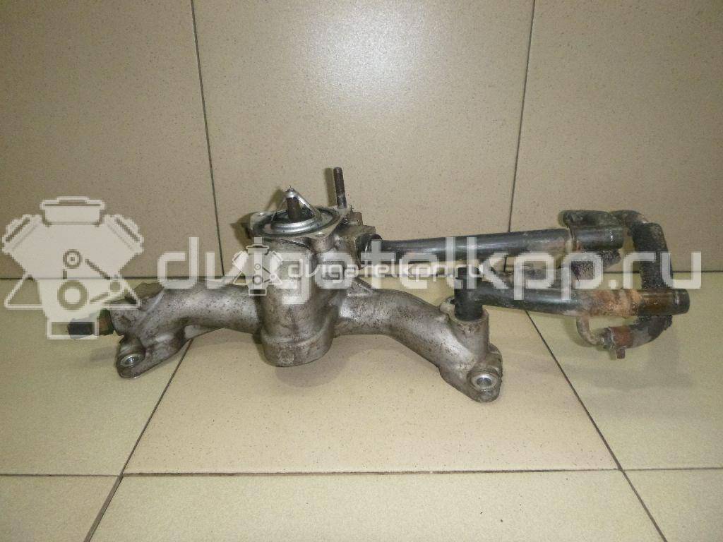 Фото Корпус термостата для двигателя G6EA для Hyundai / Kia 180-194 л.с 24V 2.7 л бензин 256003E200 {forloop.counter}}