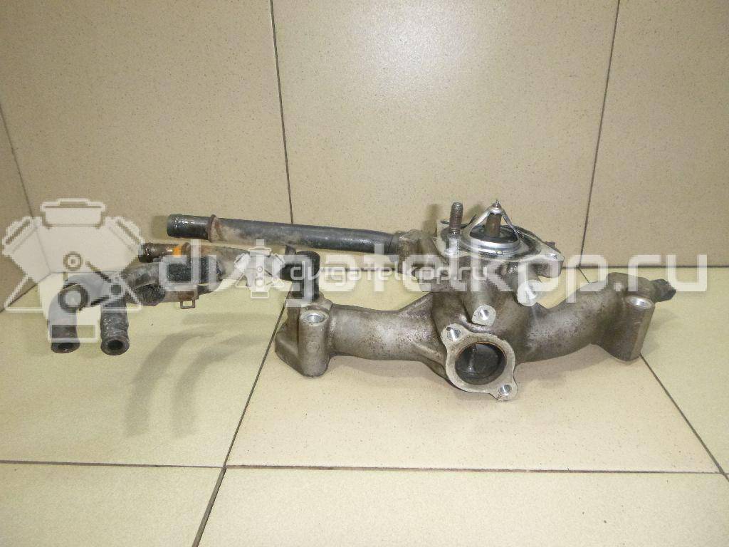 Фото Корпус термостата для двигателя G6EA для Hyundai / Kia 180-194 л.с 24V 2.7 л бензин 256003E200 {forloop.counter}}