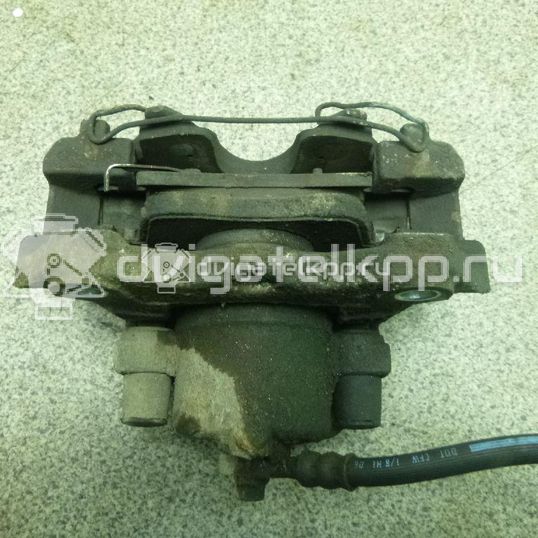 Фото Суппорт тормозной передний левый  93190644 для saab 9-5
