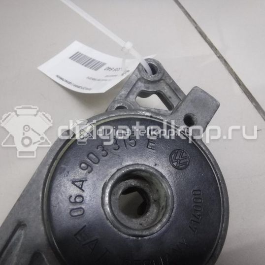 Фото Ролик руч.ремня с кронштейном  06A903315E для Seat Ibiza / Cordoba / Leon / Toledo / Alhambra