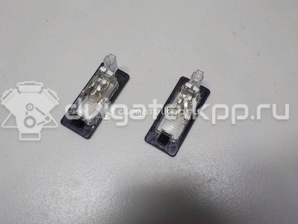 Фото Фонарь подсветки номера  5N0943021A для Seat Ibiza / Alhambra {forloop.counter}}