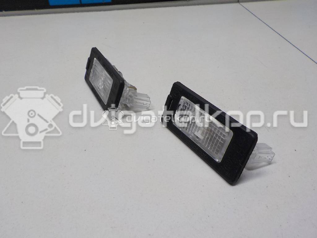 Фото Фонарь подсветки номера  5N0943021A для Seat Ibiza / Alhambra {forloop.counter}}