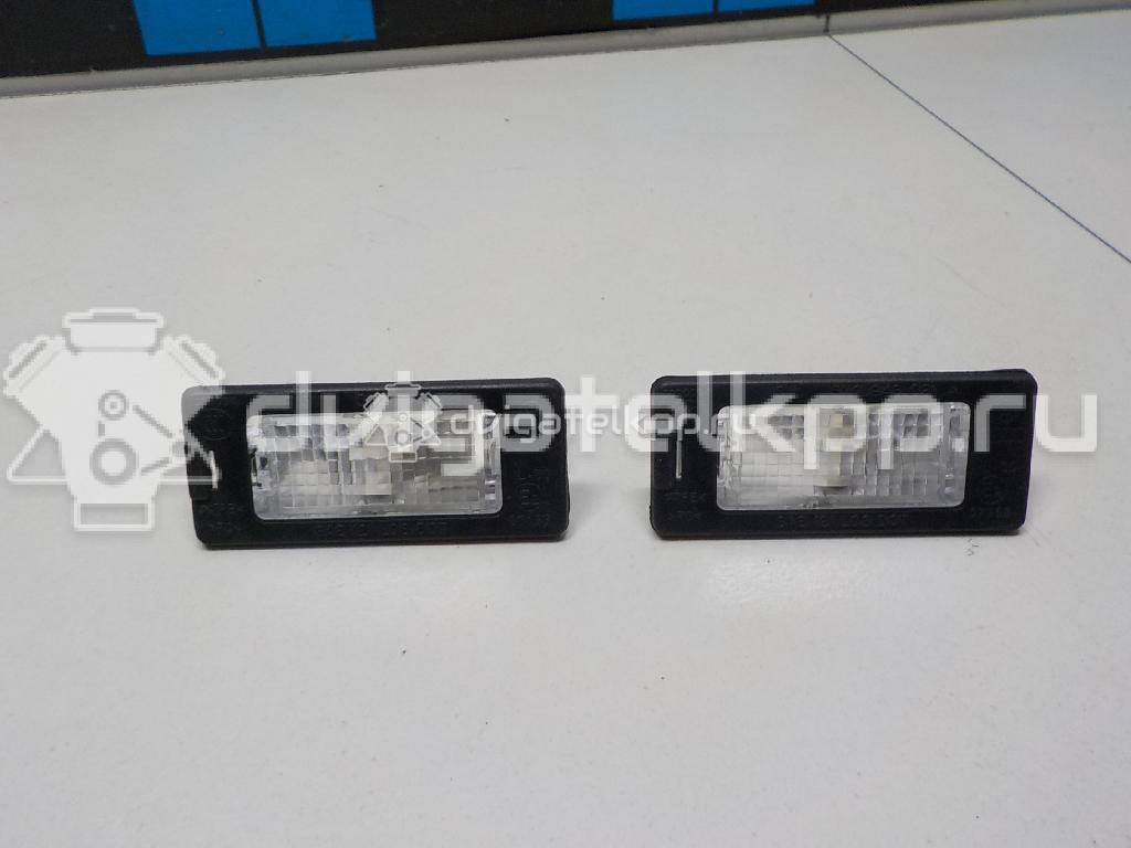 Фото Фонарь подсветки номера  5N0943021A для Seat Ibiza / Alhambra {forloop.counter}}