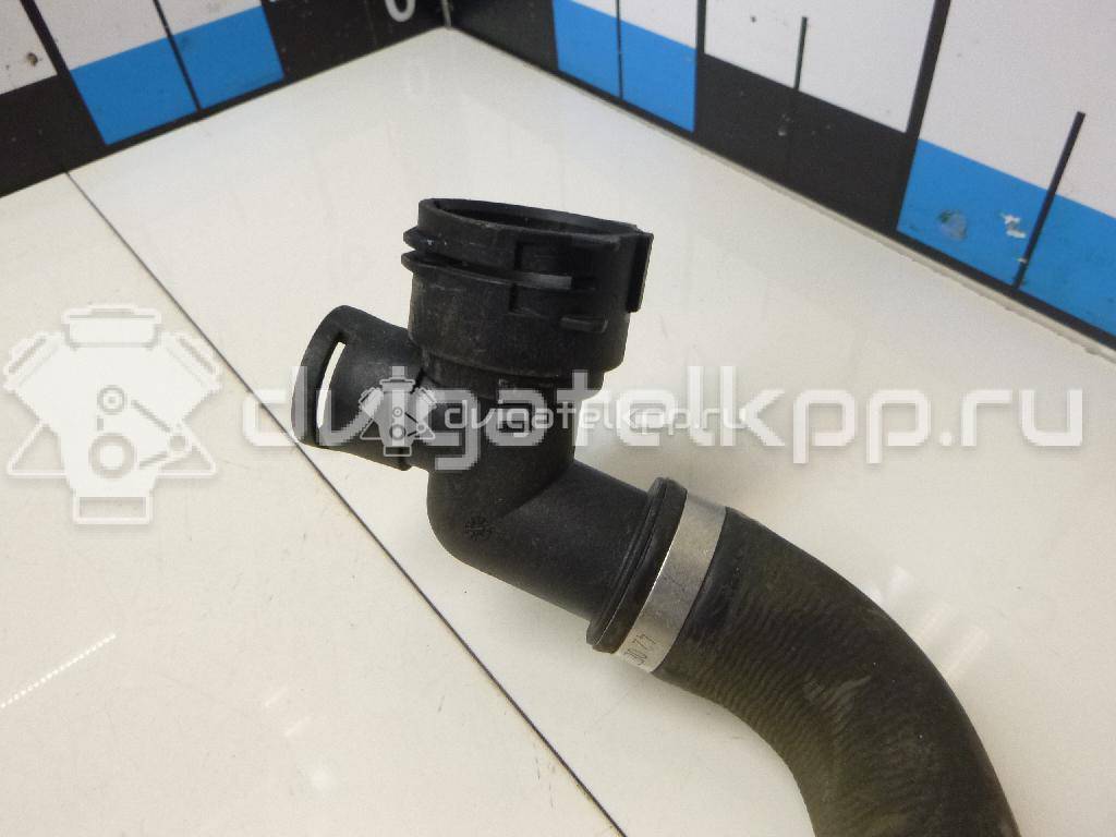 Фото Патрубок радиатора  5Q0121049AC для Seat Leon {forloop.counter}}