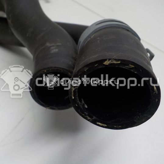 Фото Патрубок радиатора  5Q0121049AC для Seat Leon