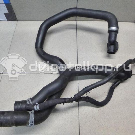 Фото Патрубок радиатора  5Q0121049AC для Seat Leon