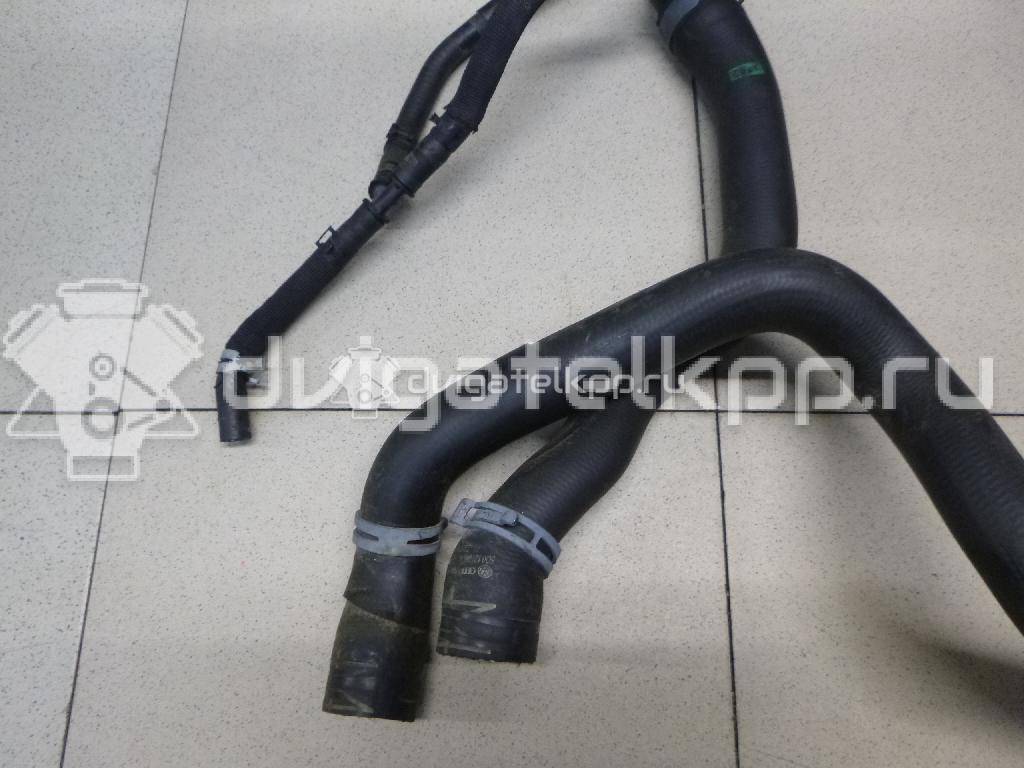 Фото Патрубок радиатора  5Q0121049AC для Seat Leon {forloop.counter}}