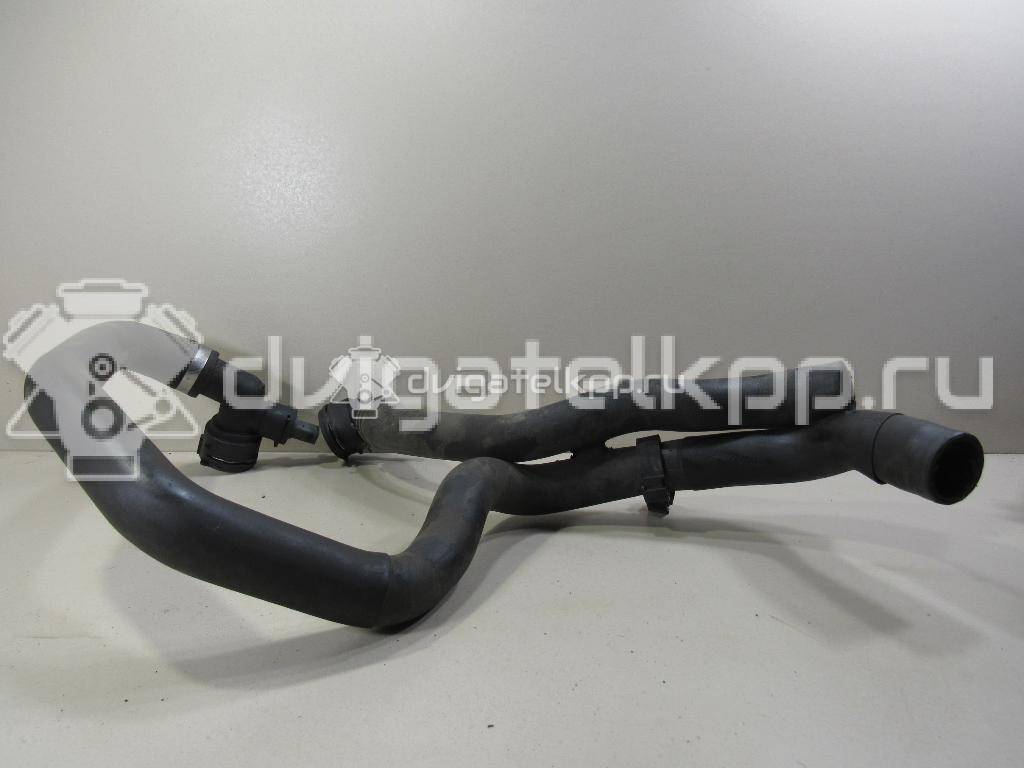Фото Патрубок радиатора  5Q0121049AC для Seat Leon {forloop.counter}}