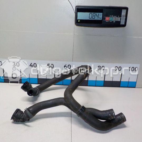 Фото Патрубок радиатора  5Q0121049AC для Seat Leon