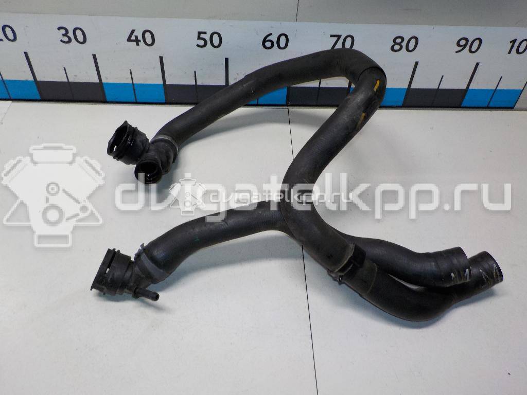 Фото Патрубок радиатора  5Q0121049AC для Seat Leon {forloop.counter}}
