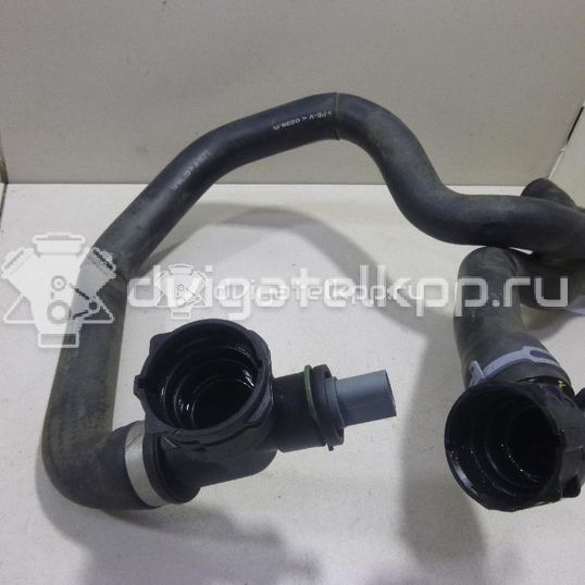 Фото Патрубок радиатора  5Q0121049AC для Seat Leon
