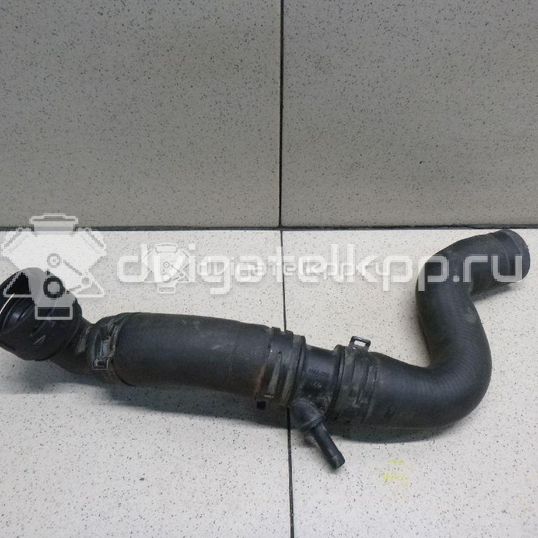 Фото Патрубок радиатора  6Q0122101CD для Skoda Fabia