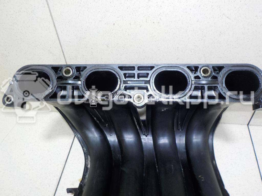 Фото Коллектор впускной для двигателя CR14DE для Nissan Note / Micra 88-98 л.с 16V 1.4 л бензин 14001AX100 {forloop.counter}}
