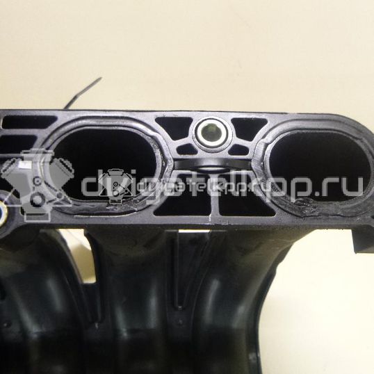 Фото Коллектор впускной для двигателя CR14DE для Nissan Note / Micra 88-98 л.с 16V 1.4 л бензин 14001AX10A