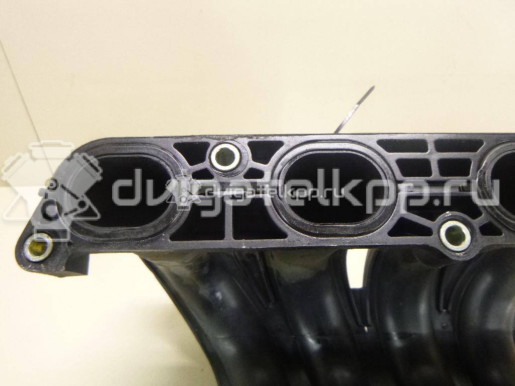 Фото Коллектор впускной для двигателя CR14DE для Nissan Note / Micra 88-98 л.с 16V 1.4 л бензин 14001AX10A {forloop.counter}}